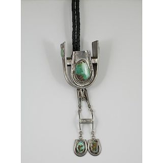 Jimmy Calabaza, Ca win (Kewa, 20th century) Silver and Turquoise "Horse Tack" Bolo Tie