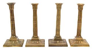 Four Mottahedeh Cast Brass Neoclassical Style Candlesticks Height 9 inches.