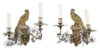Four French Gilt Metal and Carved Crystal Two-Light Wall Sconces Height 14 x width 12 x depth 4 inches.