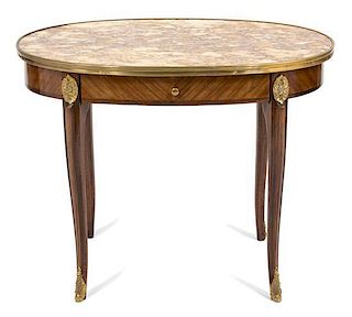 A Louis XVI Style Occasional Table Height 27 x width 25 3/4 x depth 17 1/2 inches.