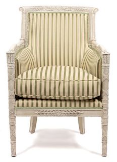 A Louis XVI Style Carved and Painted Bergere Height 27 x width 25 1/2 x depth 24 inches.