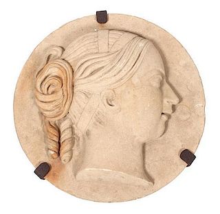 A Carved Stone Medallion Diameter 18 inches.