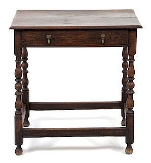 A Jacobean Style Oak Side Table Height 29 x width 27 1/2 x depth 20 inches.