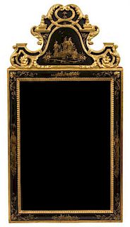 A George I Style Black and Gilt Lacquered Mirror Height 57 x width 28 inches.