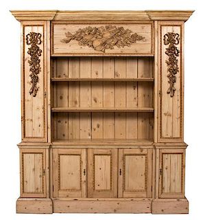 A Georgian Style Carved Pine Breakfront Height 91 x width 77 x depth 17 1/2 inches.
