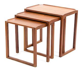A Set of Three Danish Nesting Tables Height 21 1/4 x width 14 x depth 23 inches.