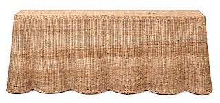 A Woven Rattan Console Table Height 30 1/2 x width 78 x depth 18 inches.