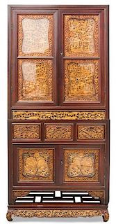 A Chinese Export Gilt Lacquered Rosewood Cabinet Height 73 1/2 x width 32 1/2 x depth 16 inches.