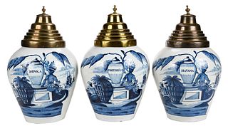 Three Delft Tobacco Jars with Brass Lids