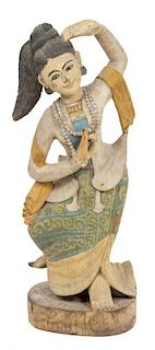 A Southeast Asian Carved Wood and Polychrome Dancing Figure Height 35 inches.