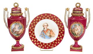 Three Meissen and Sevres Cranberry Enamel and Gilt Porcelain Table Objects