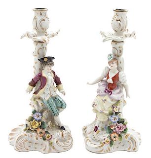 A Pair of Continental Porcelain Candlesticks Height 9 1/2 inches.