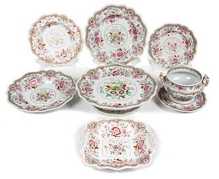 An English Ironstone Partial Dinner Service Diameter of first 10 1/4 inches.