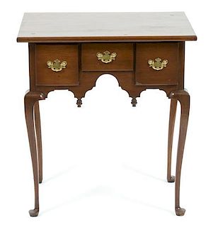 A Queen Anne Style Lowboy Height 27 1/2 x width 25 x depth 17 1/2 inches.