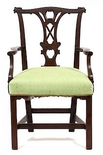A Chippendale Style Mahogany Open Armchair Height 37 1/2 inches.