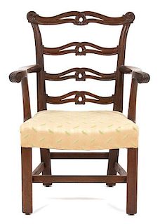 A Diminutive Chippendale Style Mahogany Open Armchair Height 26 3/4 inches.