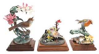 Three Royal Worcester Porcelain Bird Figures Height of tallest 10 inches.