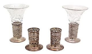 A Group of Four American Silver Trumpet Form Vase Holders, Wilcox & Wagoner, New York, NY, 20th Century, two having cut glass