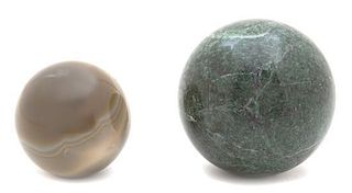 Two Round Hardstones Spheres Diameter of largest 3 inches.