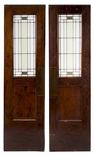 Attributed to William Eugene Drummond, (American, 1876-1948), a pair of American leaded-glass windows mounted in oak doors