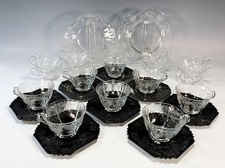 GLASS CUPS AND SAUCERS