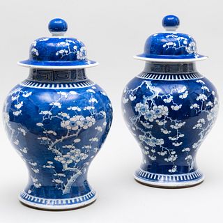 Pair of Chinese Blue and White Porcelain Vases with Covers Decorated with Prunus