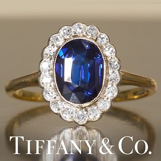 TIFFANY & CO, EDWARDIAN SAPPHIRE AND DIAMOND CLUSTER RING