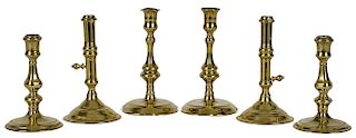 Three pairs of English Queen Anne brass candlesticks, 18th c., tallest - 7 1/2'' h. Provenance: Ren
