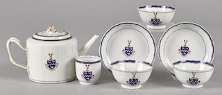 Chinese export porcelain teawares, early 19th c., to include a teapot, 5 3/4'' h., two saucers, and