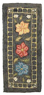Floral hooked rug or table cover, early 20th c., 16'' x 36''.