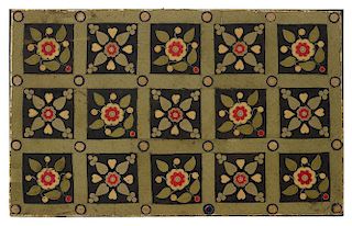 Appliqué table cover, 19th c., with flowers in a grid, 31'' x 50''.