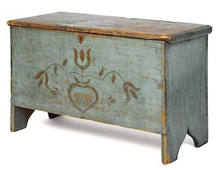New England painted pine blanket chest, early 19th c., retaining its original floral decoration on