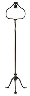 Tiffany Studios patinated bronze harp floor lamp, with trefoil base and leaf feet, 55'' h.