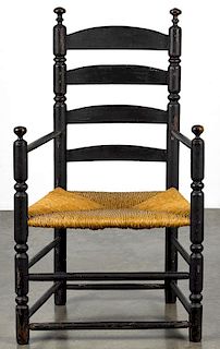 New England ladderback armchair, 18th c., retaining an old black surface. Provenance: Rentschler c