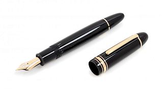 A Montblanc UNICEF: Helmut John Limited Edition Fountain Pen and Ink Set