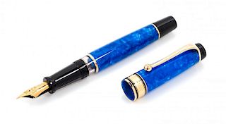 An Aurora Mare Limited Edition Fountain Pen and Ink Set