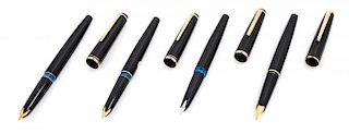 A Group of Four Montblanc Fountain Pens Length of longest 5 3/8 inches.