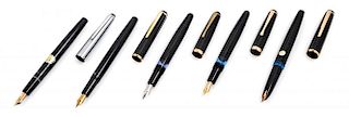 A Collection of Five Montblanc Fountain Pens Length of longest 5 1/4 inches.