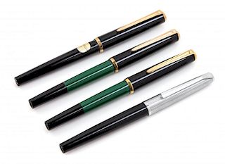 A Collection of Four Pelikan Fountain Pens Length of each 5 1/4 inches.