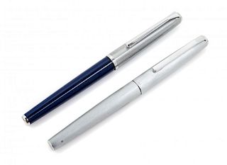 Two Pelikan Silvexa Fountain Pens Length of each 5 1/4 inches.