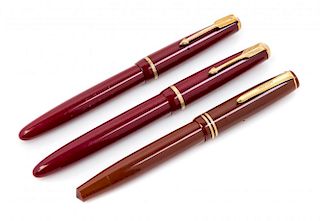 A Group of Three Parker Fountain Pens Length of longest 5 1/2 inches.