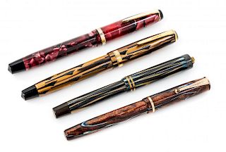 A Group of Four Parker Fountain Pens Length of longest 5 1/8 inches.