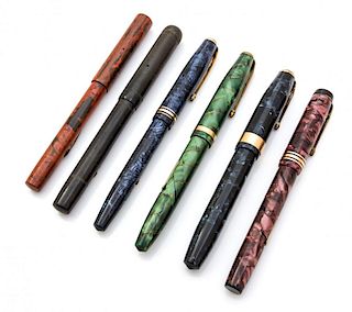 A Collection of Six Conway-Stewart Fountain Pens Length of longest 5 3/8 inches.