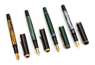 A Set of Four Vintage Pelikan Fountain Pens Length of each 5 inches.