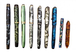 A Collection of Nine Onoto Fountain Pens Length of longest 5 1/4 inches.