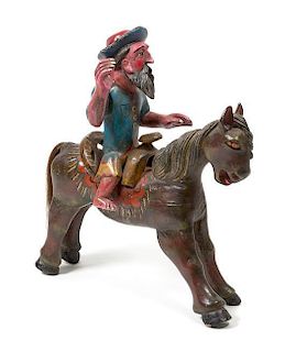 A Painted Wood Sculpture of a Saint on a Horse Height 29 x width 11 x depth 26 inches.