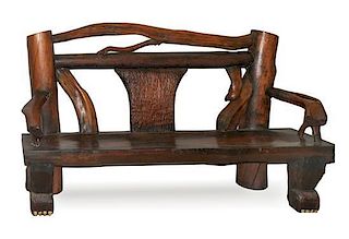 A Pair of Log Benches Height 48 x width 75 x depth 28 inches.