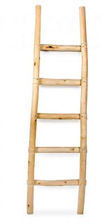 A Decorative Western Ladder Height 84 x width 23 1/2 inches.