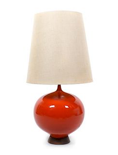 A Red Ceramic and Wood Table Lamp Height 41 inches.