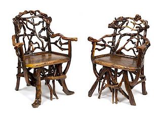 A Pair of Natural Branch and Limb Chairs Height 39 inches.